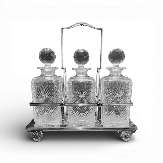 Antique Silver-Plate Tantalus with Three Cut Crystal Bottles