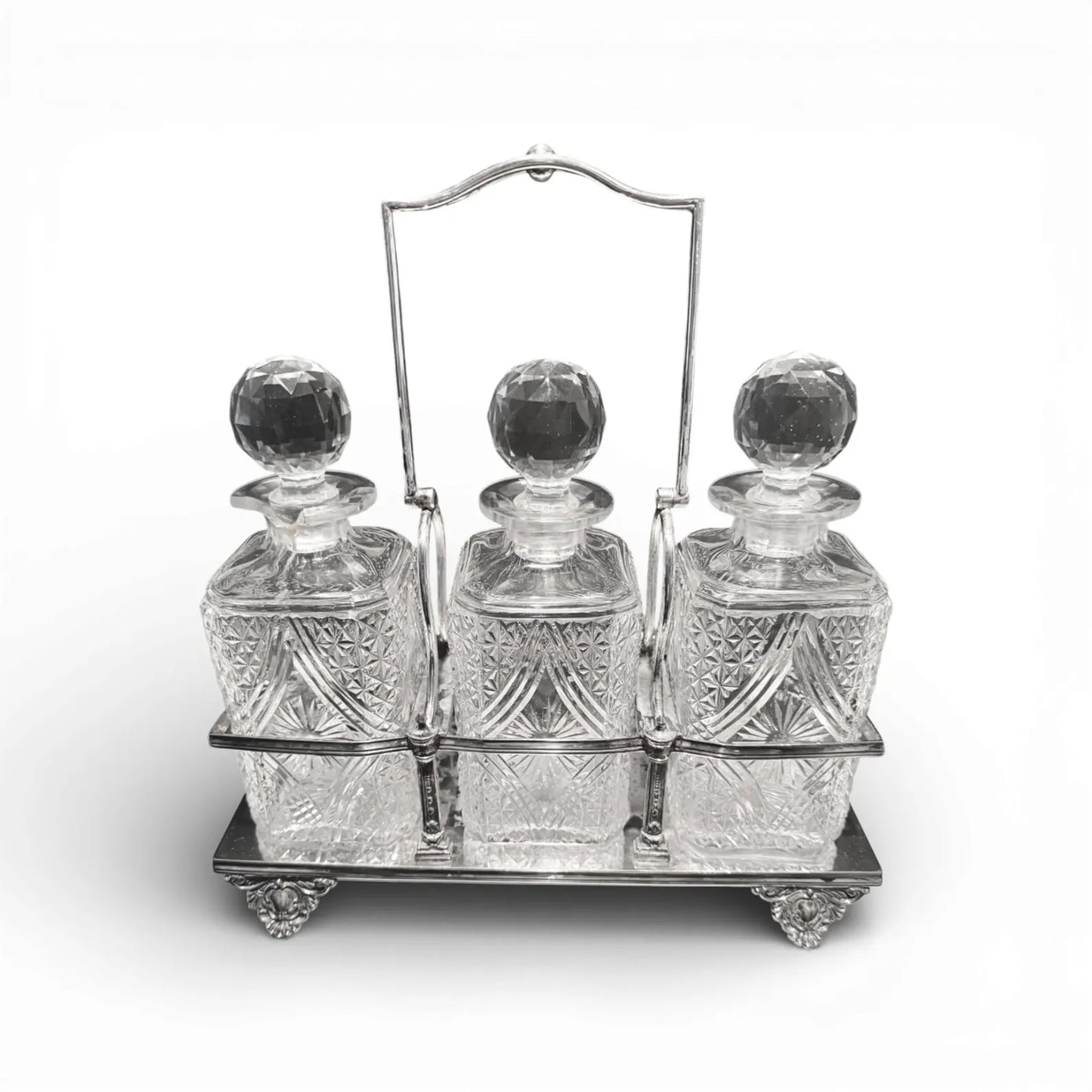 Antique Silver-Plate Tantalus with Three Cut Crystal Bottles